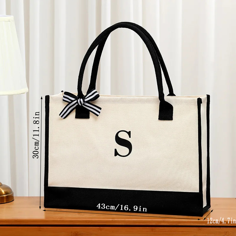 Simple canvas letter tote bag  - Ribbon Bow Gift 리뷰 및 가격